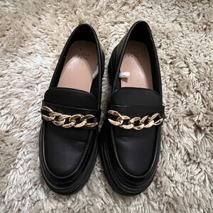 Black loafers